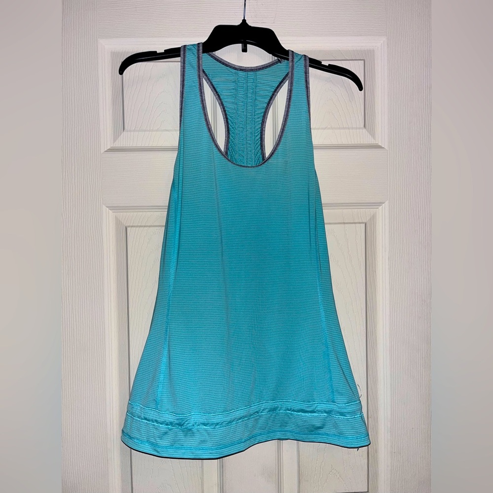 Lululemon Blue Tank with adjustable hem string at bottom.